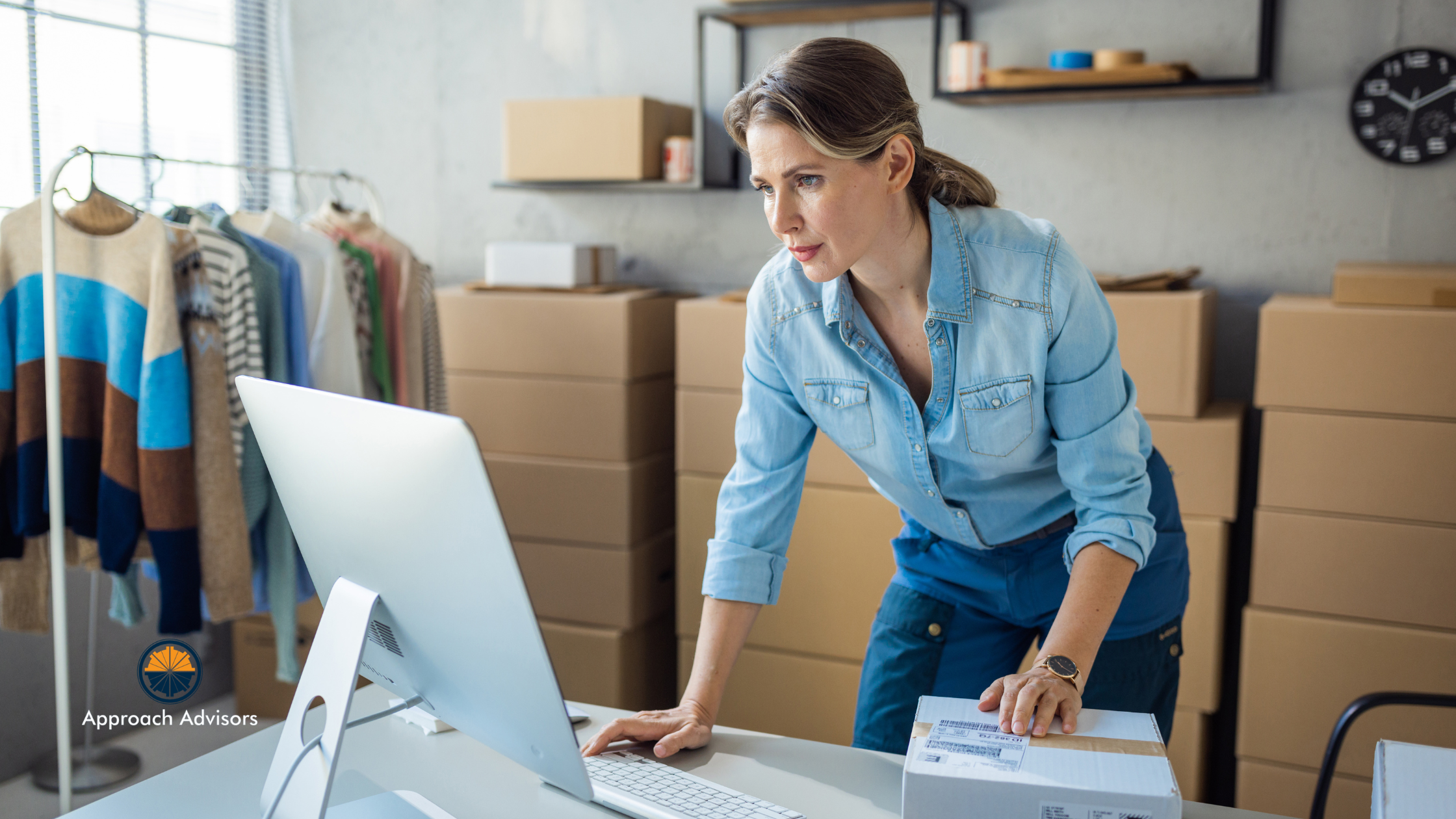 Small business owner analyzing orders and online data at her desk, representing a hands-on approach to content strategy analysis for e-commerce growth.
