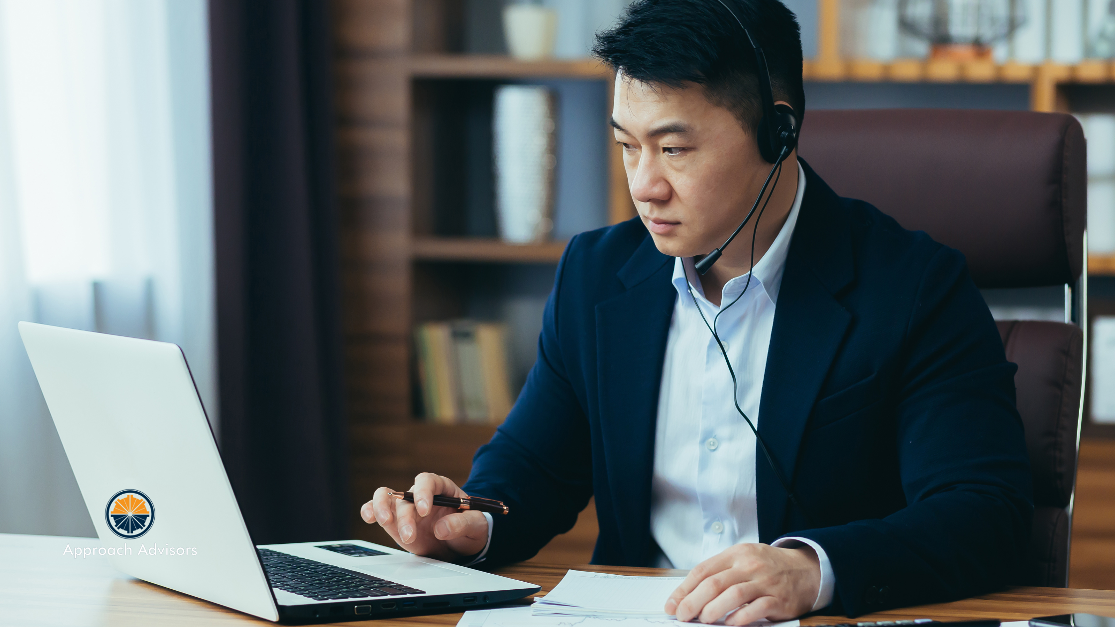 Business advisor conducting a virtual consultation session, representing Business Advising & Consulting services for small to mid-size companies.